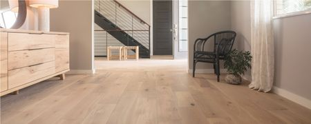 Light wood flooring in a modern home hallway and living space | Dalton Flooring of Georgia