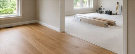 Warm wood flooring in a bright open room | Dalton Flooring of Georgia